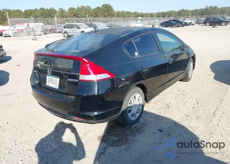 2011 Honda Insight from USA, damaged, VIN JHMZE2H36BS006488